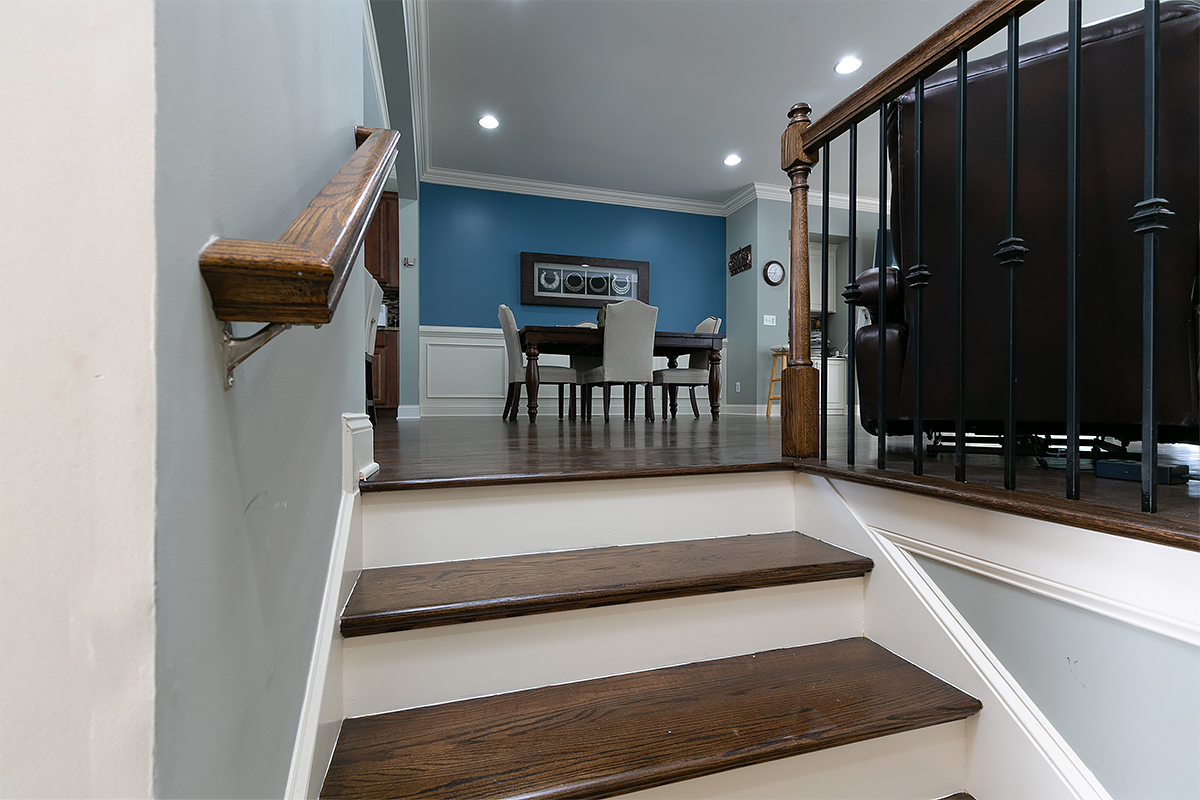 Finished hardwood staircase by Final Floors LLC representing Cumming and Forsyth County flooring services