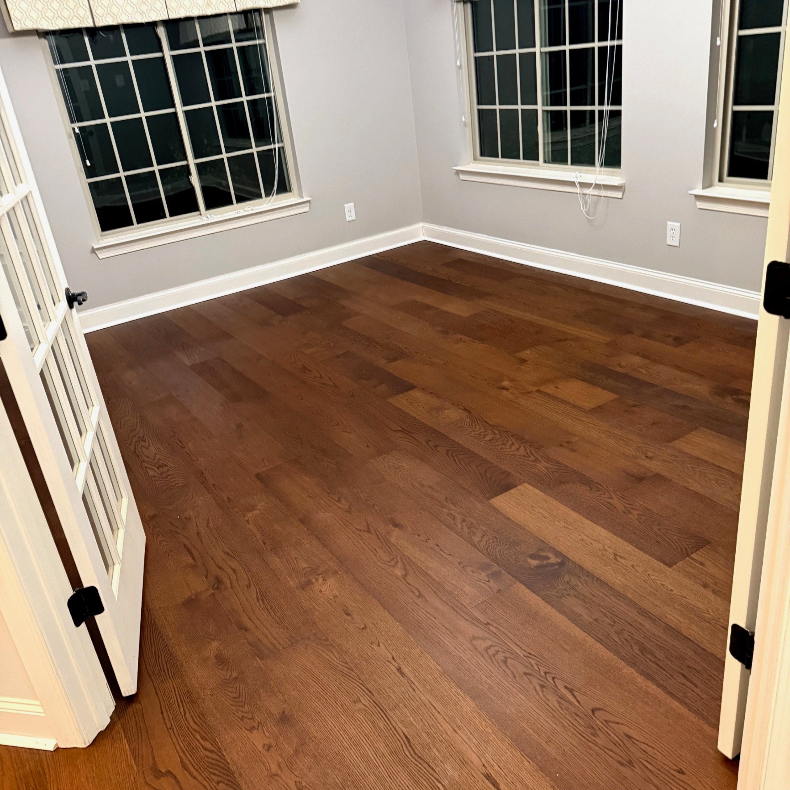 Finished hardwood flooring after professional refinishing by Final Floors LLC